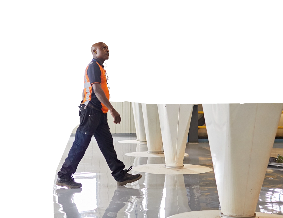 Person walking through grain facility