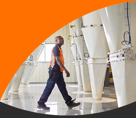 Person walking through grain facility